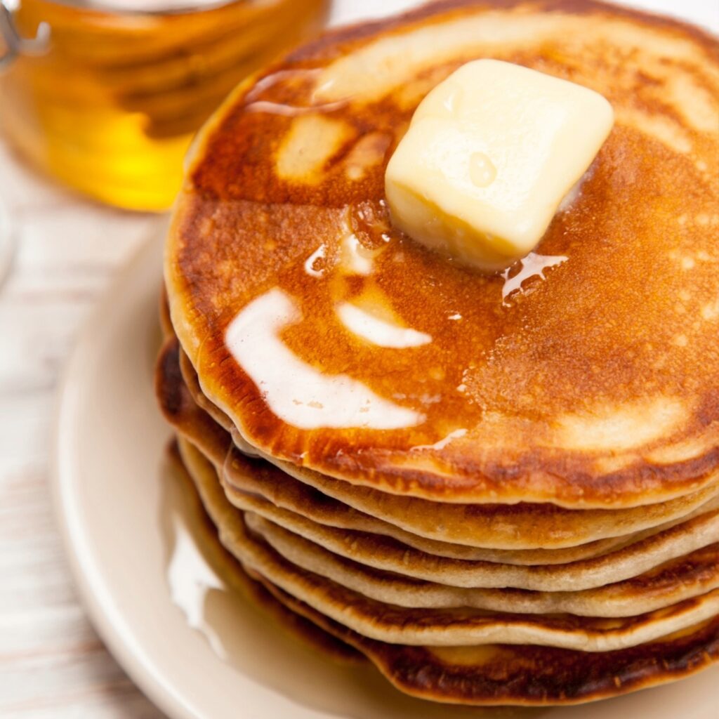 How to make Fluffy Pancakes with syrup on plate