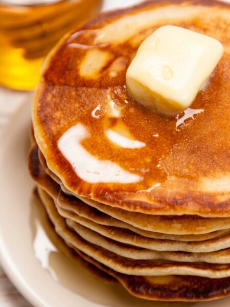 How to make Fluffy Pancakes with syrup on plate