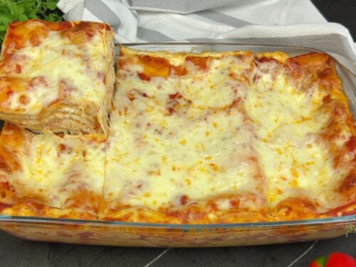 baked classic four cheese lasagna in plate