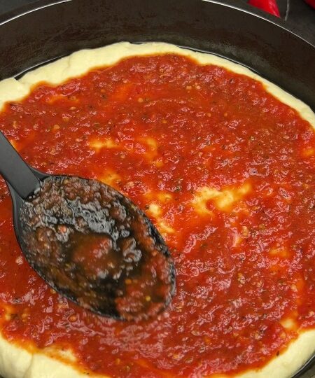 homemade pizza sauce recipe on dough